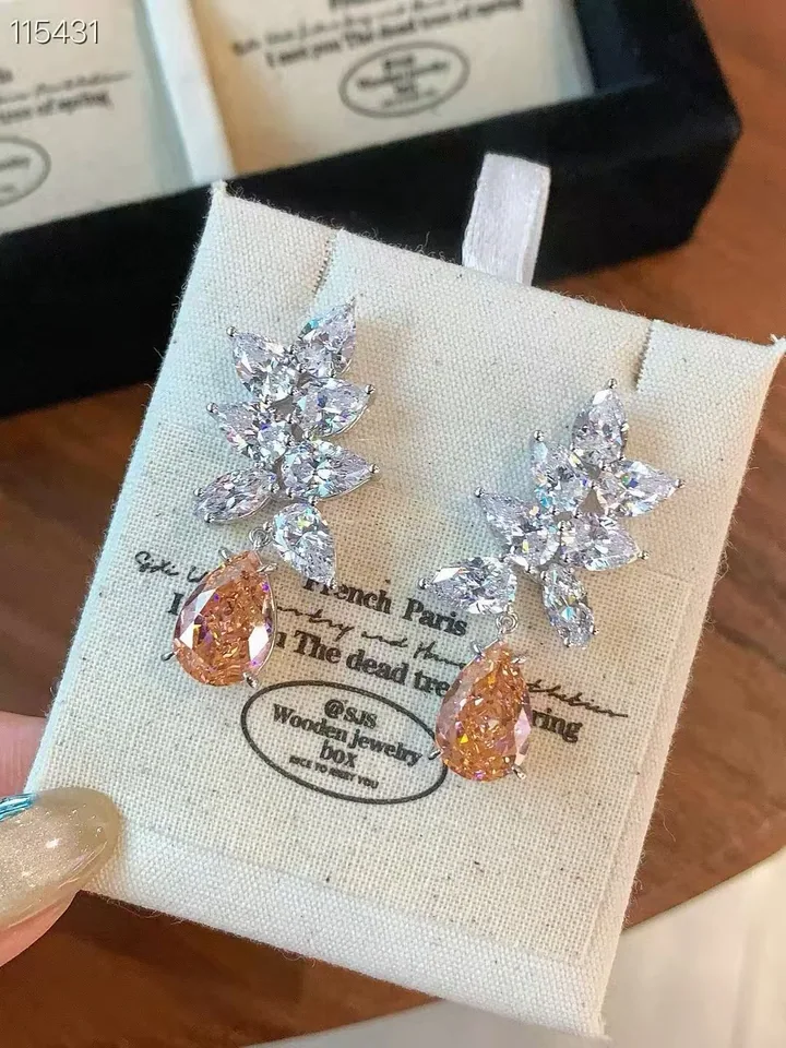 Peach drop earrings, customer photograph