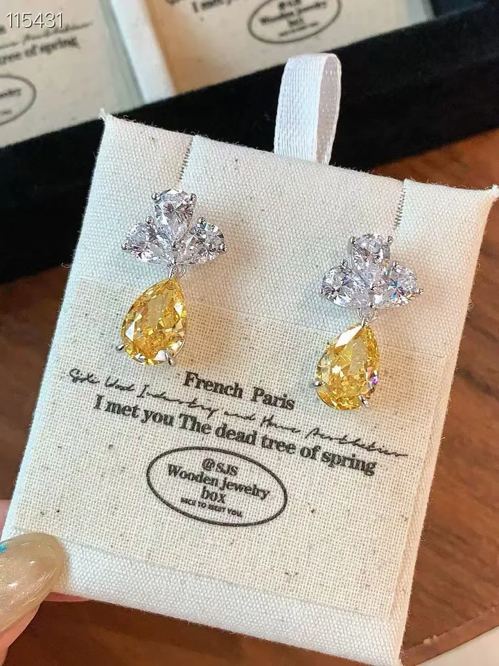 Yellow drop earrings, customer photograph