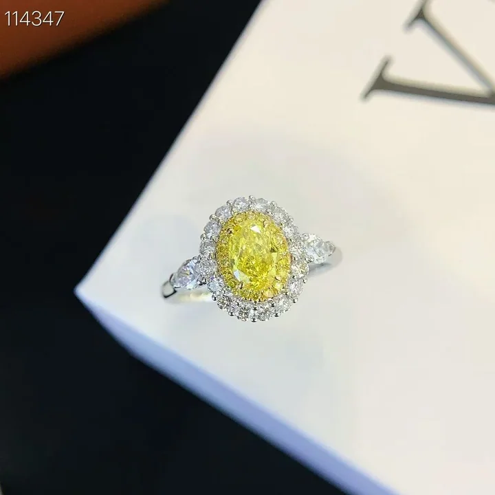 Yellow oval halo ring, customer photograph